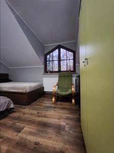 Postel nebo postele na pokoji v ubytování Willa Wiekowa Sosna
