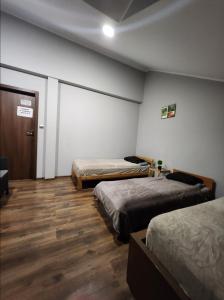 Postel nebo postele na pokoji v ubytování Willa Wiekowa Sosna