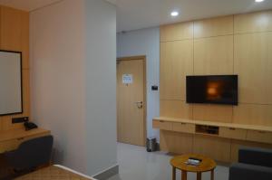 TV a/nebo společenská místnost v ubytování JBR Residency