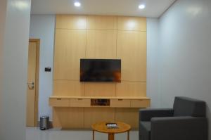 TV a/nebo společenská místnost v ubytování JBR Residency