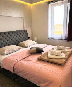 Postel nebo postele na pokoji v ubytování Gas Otel + 16 fotografií