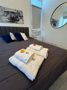 Postel nebo postele na pokoji v ubytování Refugio Ballenas