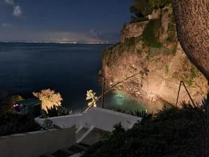 a view of a large body of water at night at Casa vacanza in lipari ,PIANO PIANO in Lipari