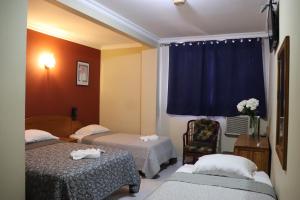 Krevet ili kreveti u jedinici u objektu Hotel Toledo