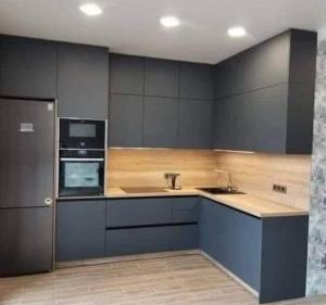 Кухня или мини-кухня в B living Apartments
