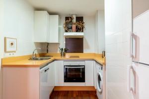 Kuchyňa alebo kuchynka v ubytovaní Veoapartment Alhóndiga Segundo