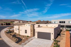 a row of white buildings in a city at Azure Abode at Sand Hollow Resort in Hurricane
