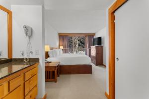 a hotel room with a bed and a window at Decatur 1785 by Summit County Mountain Retreats in Keystone +19 photos