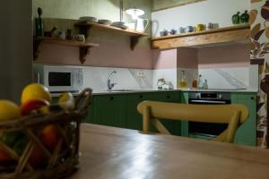 Kuchyň nebo kuchyňský kout v ubytování Casa María Berna