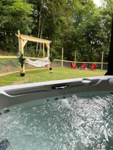 a close up of the view of a car window with a park at Flat Fenced Yard, Hot Tub, Wifi, Pool Table in Sevierville