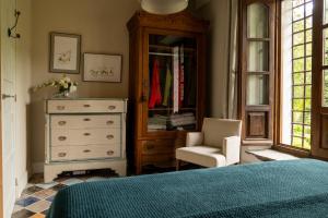 Postel nebo postele na pokoji v ubytování Casa María Berna