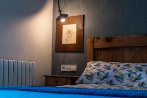 Postel nebo postele na pokoji v ubytování Casa María Berna