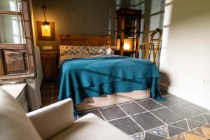 Postel nebo postele na pokoji v ubytování Casa María Berna