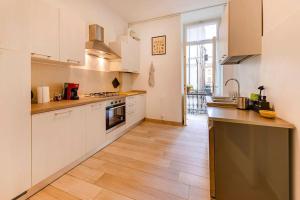 Η κουζίνα ή μικρή κουζίνα στο RELAX - Historic Center with 3 Bedrooms and Free ZTL Pass