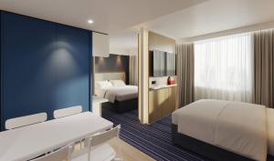 Postel nebo postele na pokoji v ubytování Holiday Inn Express & Suites Ghent by IHG