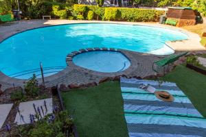 Kolam renang di atau dekat dengan Modern Family Unit in Green Point - Parking & Pool