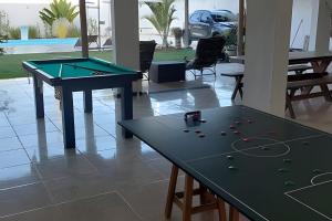 Biliár nebo kulečník v ubytování Casa de temporada Guriri com Piscina - Cod 34