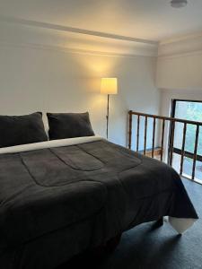 Postel nebo postele na pokoji v ubytování Portal Fernández Concha