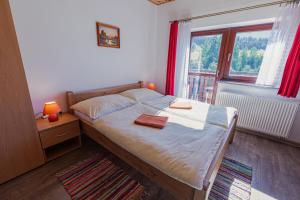 Postel nebo postele na pokoji v ubytování Penzión Bachleda