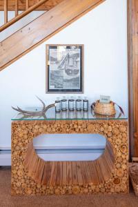 a room with a glass counter with a wooden floor at Take a break from it all escape to the mountains in Grand Lake