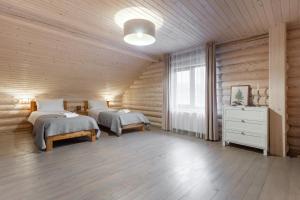 Rúm í herbergi á Chalet Borzhava