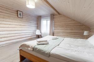 Rúm í herbergi á Chalet Borzhava