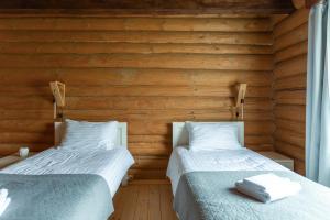 Rúm í herbergi á Chalet Borzhava