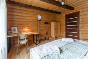 Rúm í herbergi á Chalet Borzhava
