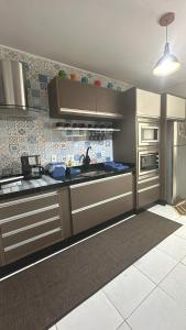 Η κουζίνα ή μικρή κουζίνα στο Cantinho da jana