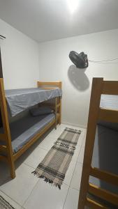 Ένα ή περισσότερα κρεβάτια σε δωμάτιο στο Cantinho da jana