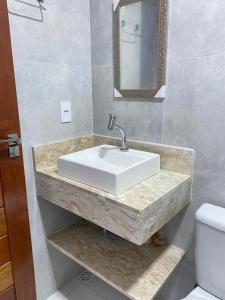Bilik mandi di Suítes Central