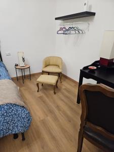 Posezení v ubytování Mxp Room Busto