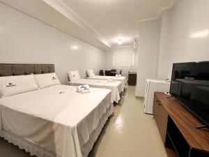 TV a/nebo společenská místnost v ubytování Danny's Hotel + 23 fotografií
