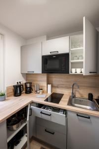 Kuchyňa alebo kuchynka v ubytovaní Apartament26