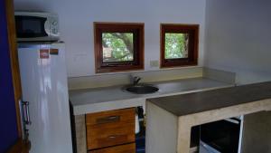 Kuchyň nebo kuchyňský kout v ubytování Apart Finiterra