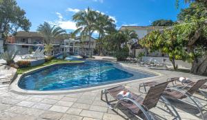 Bazén v ubytování Ramada by Wyndham Porto Seguro Praia nebo v jeho okolí
