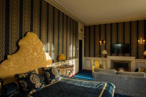 Coin salon dans l'établissement Château de Courcelles - Relais & Châteaux