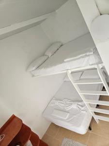 a small room with a bunk bed in it at Casita amada in Santa Cruz de Tenerife