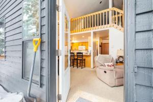 a house with a door open to a living room at Ski & Snowboard Games Hiking Trails in Snoqualmie Pass