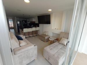 Posezení v ubytování apartamento vista al lago