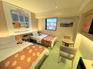 Cama ou camas em um quarto em Henn na Hotel Premier Nara