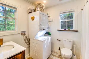 a bathroom with a toilet and a sink at Deck and Grill Cozy Cottage in Talking Rock! in Talking Rock +22 photos