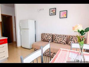 Kuchyň nebo kuchyňský kout v ubytování Apartments Ljuba