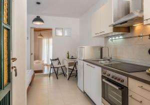 Kuchyň nebo kuchyňský kout v ubytování Apartments Milica