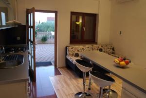 Kuchyňa alebo kuchynka v ubytovaní Apartments Brane
