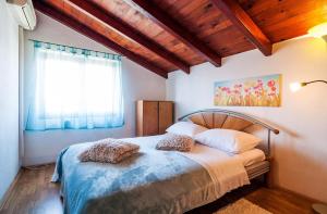Posteľ alebo postele v izbe v ubytovaní Apartments Brane