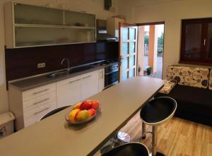 Kuchyňa alebo kuchynka v ubytovaní Apartments Brane
