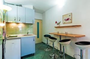 Kuchyňa alebo kuchynka v ubytovaní Apartments Brane