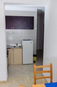 Kuchyň nebo kuchyňský kout v ubytování Apartments Ljuba