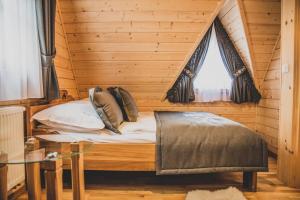 Postel nebo postele na pokoji v ubytování TatryTop Dom Krzeptówki Zakopane